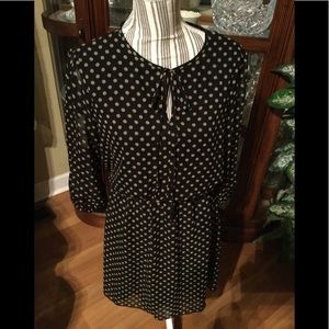Black dress with gold polka dots